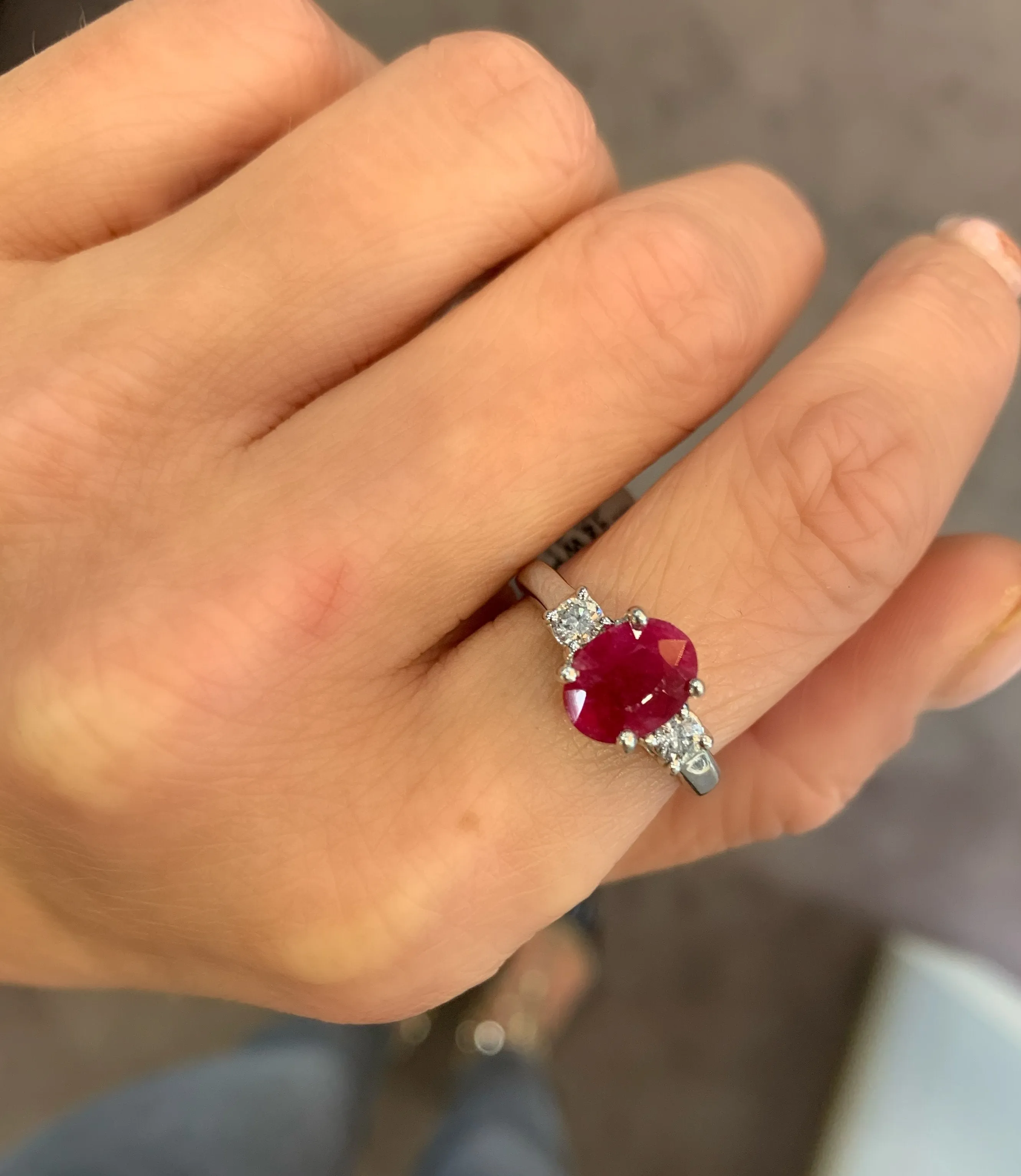14K White Gold Oval Ruby And Diamond Three Stone Ring (2ctw)