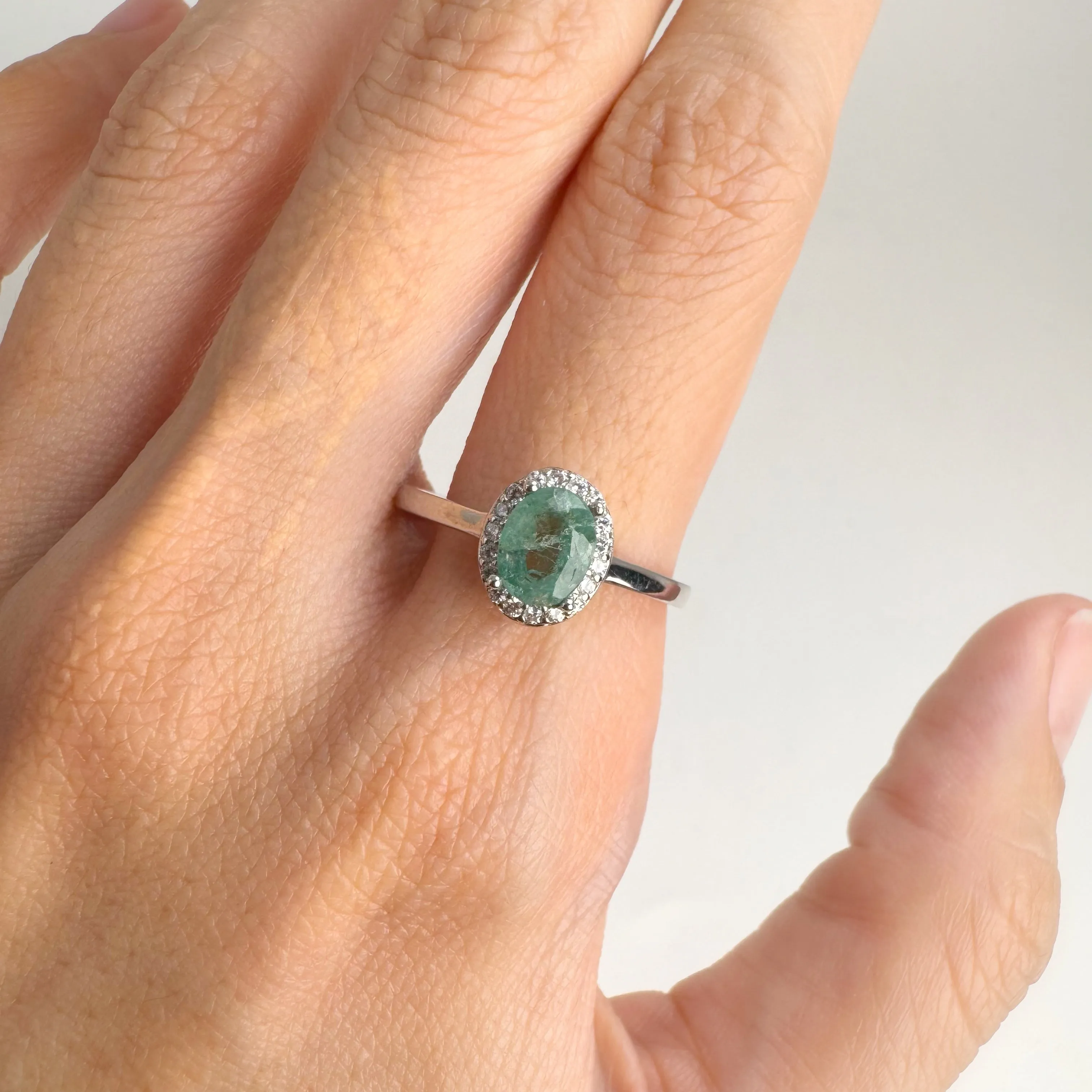 5 x 7 mm. Oval Cut Green Zambian Emerald with Cz Halo Ring