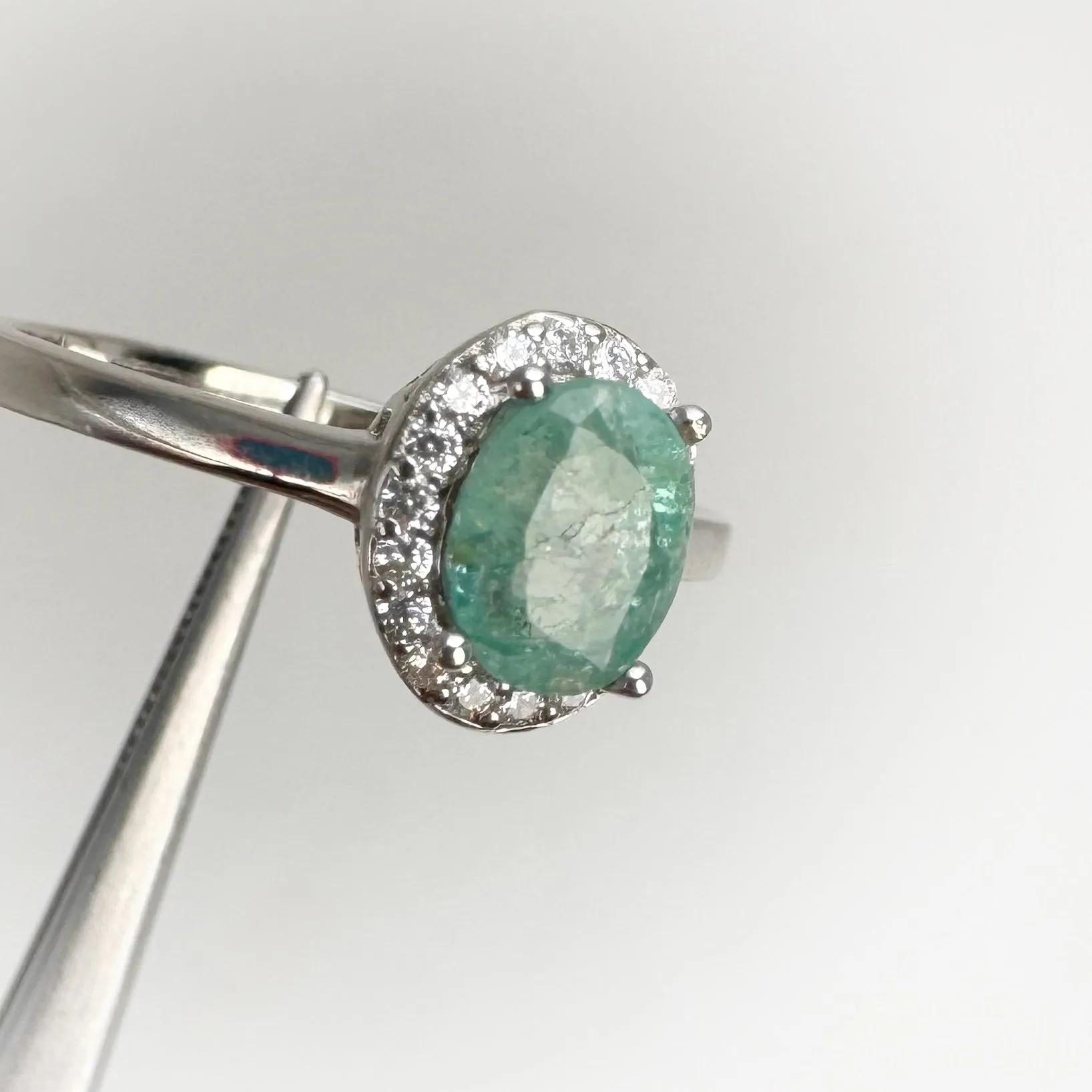 5 x 7 mm. Oval Cut Green Zambian Emerald with Cz Halo Ring