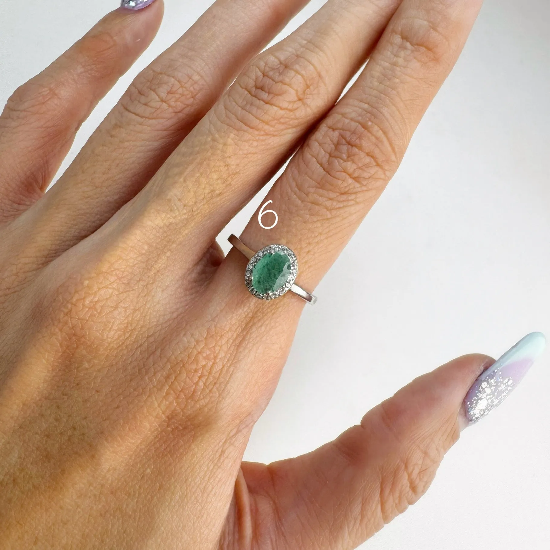 5 x 7 mm. Oval Cut Green Zambian Emerald with Cz Halo Ring