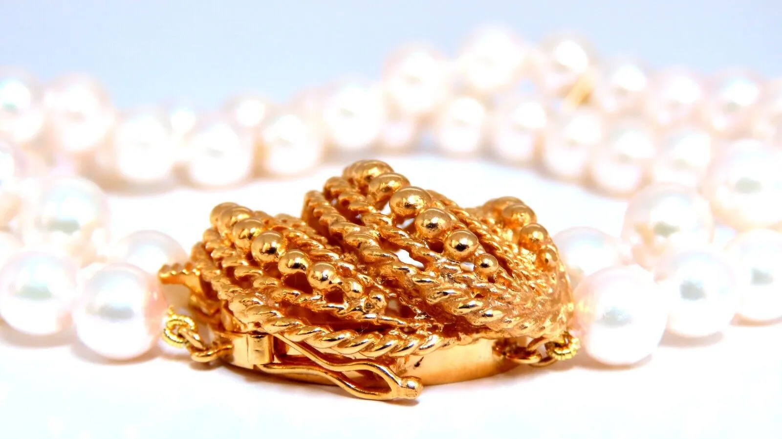 6.75mm Akoya pearls pearls double stranded bracelet 14kt Shell Twist Clasp