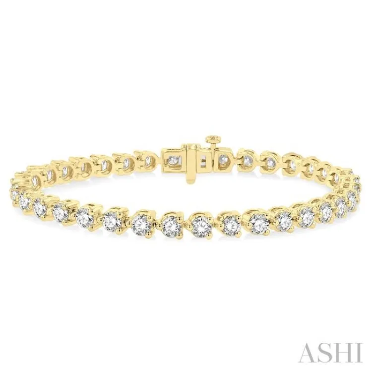 7 ctw Tri-Prong Round Cut Diamond Tennis Bracelet in 14K Yellow Gold