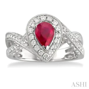 7x5mm Pear Shape Ruby and 3/4 Ctw Round Cut Diamond Ring in 14K White Gold