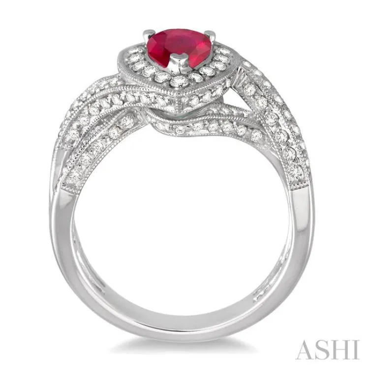 7x5mm Pear Shape Ruby and 3/4 Ctw Round Cut Diamond Ring in 14K White Gold