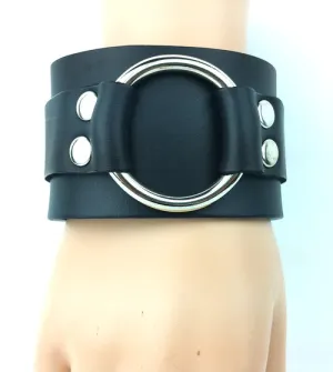 Black leather bracelet w/ large silver O ring connected strap
