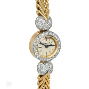 Cartier diamond and gold backwound wristwatch
