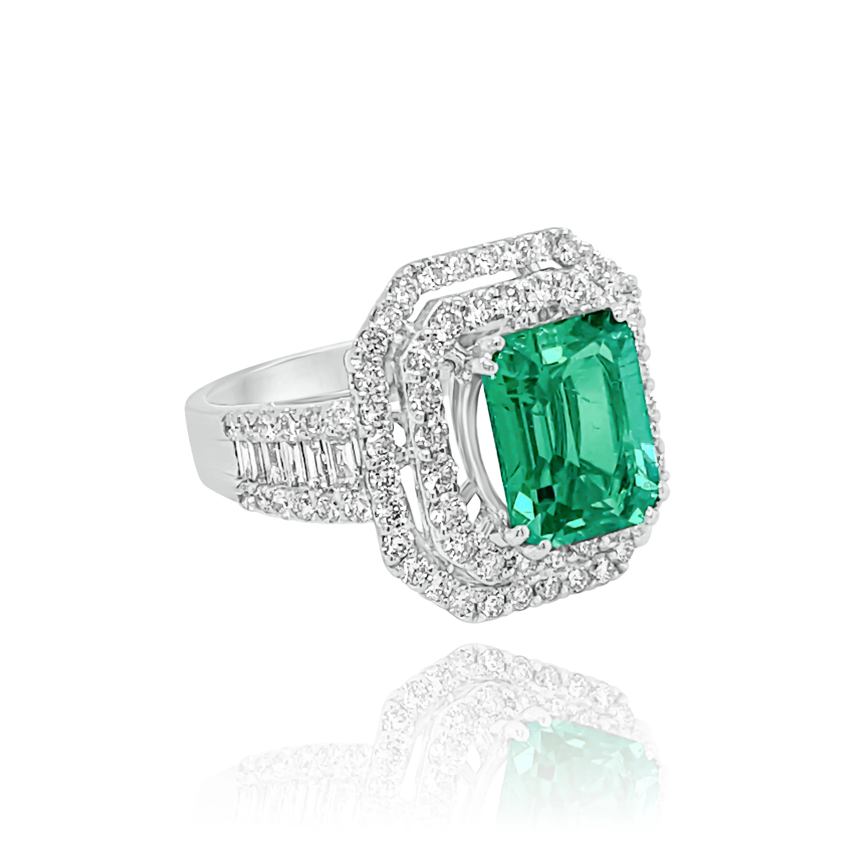 DIAMONDS & EMERALD "ASTRID" RING.