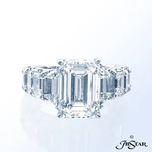 JB STAR PLATINUM AND DIAMOND RING FEATURING BEAUTIFUL 5.31CT EMERALD-CUT DIAMOND EMBRACED BY TRAPEZO