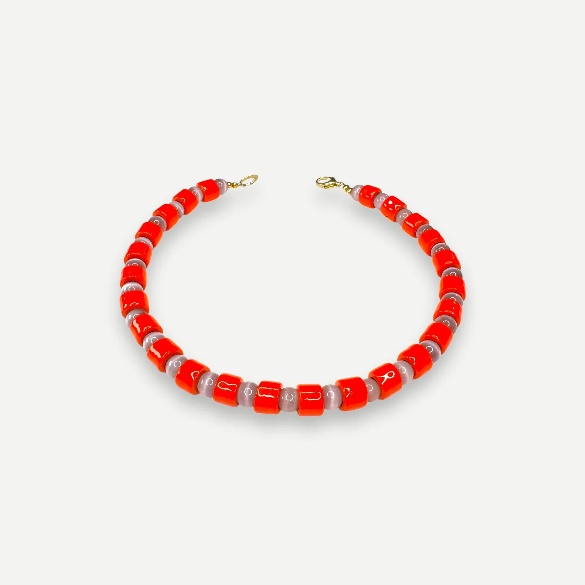 LOBSTER & CAT EYE SUNDRY.  BEAD ONE.