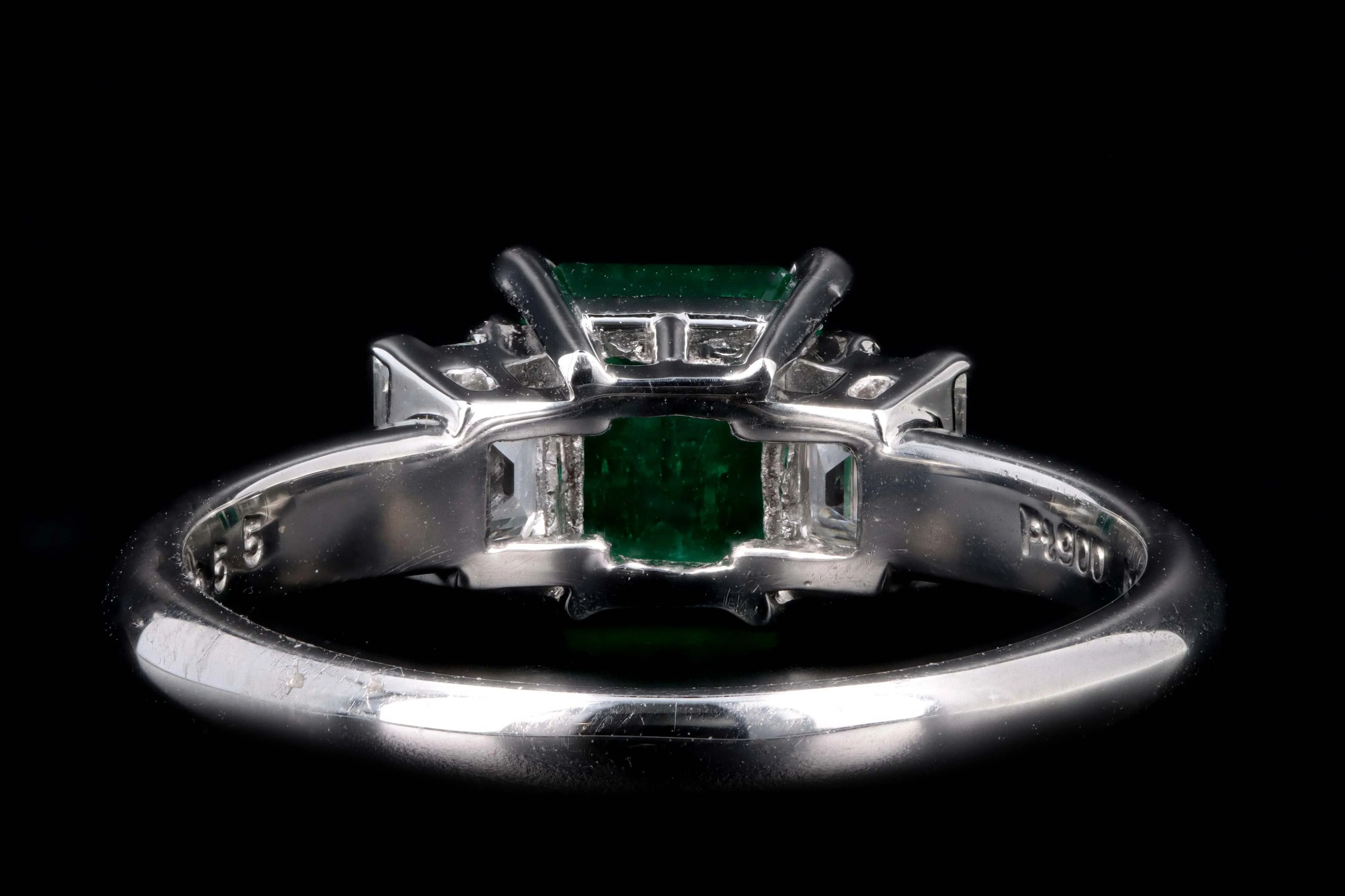 Modern Platinum .77 Carat Emerald & Diamond Ring