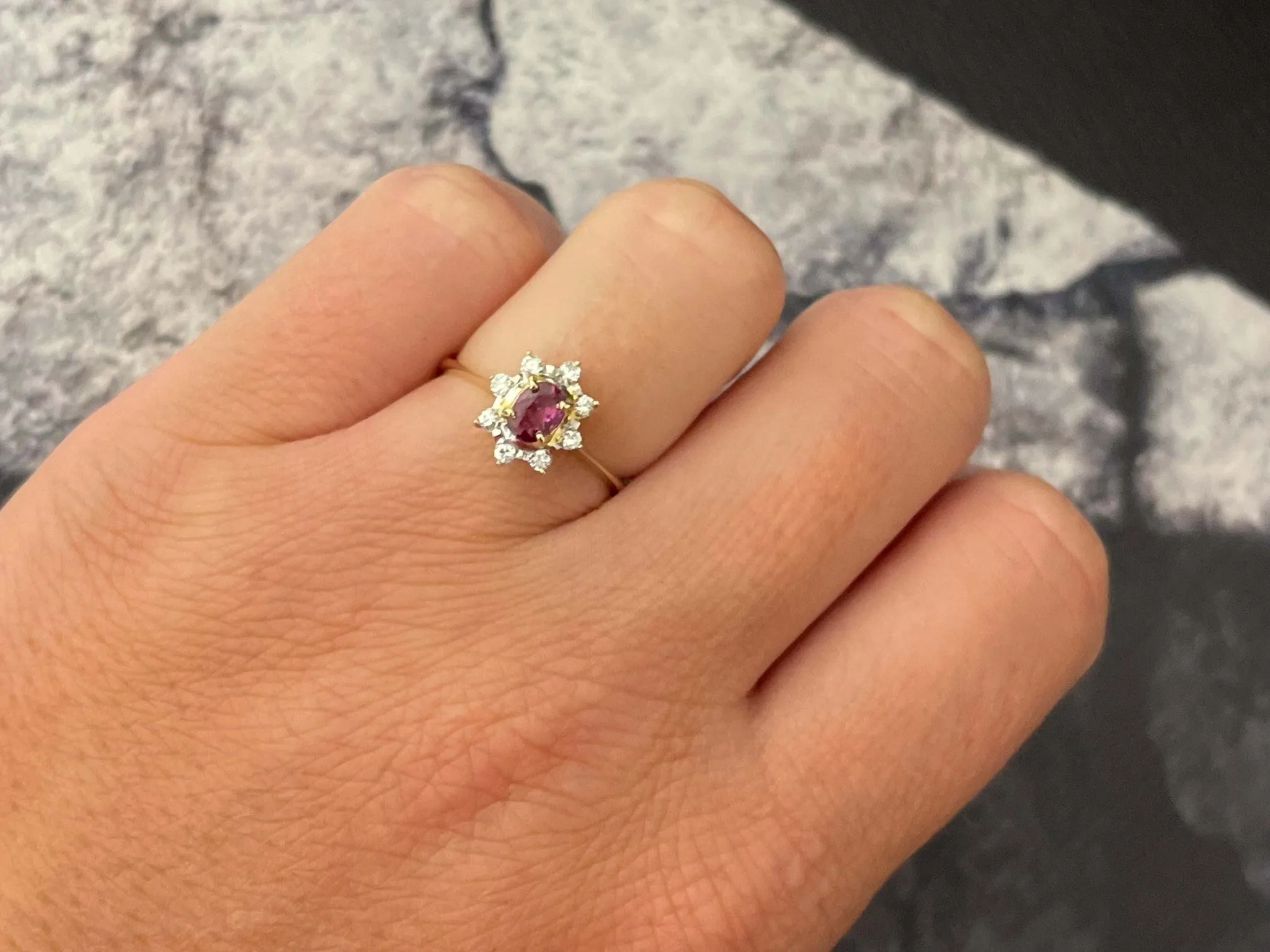 Oval Ruby and Diamond Halo Ring in 14k Yellow Gold