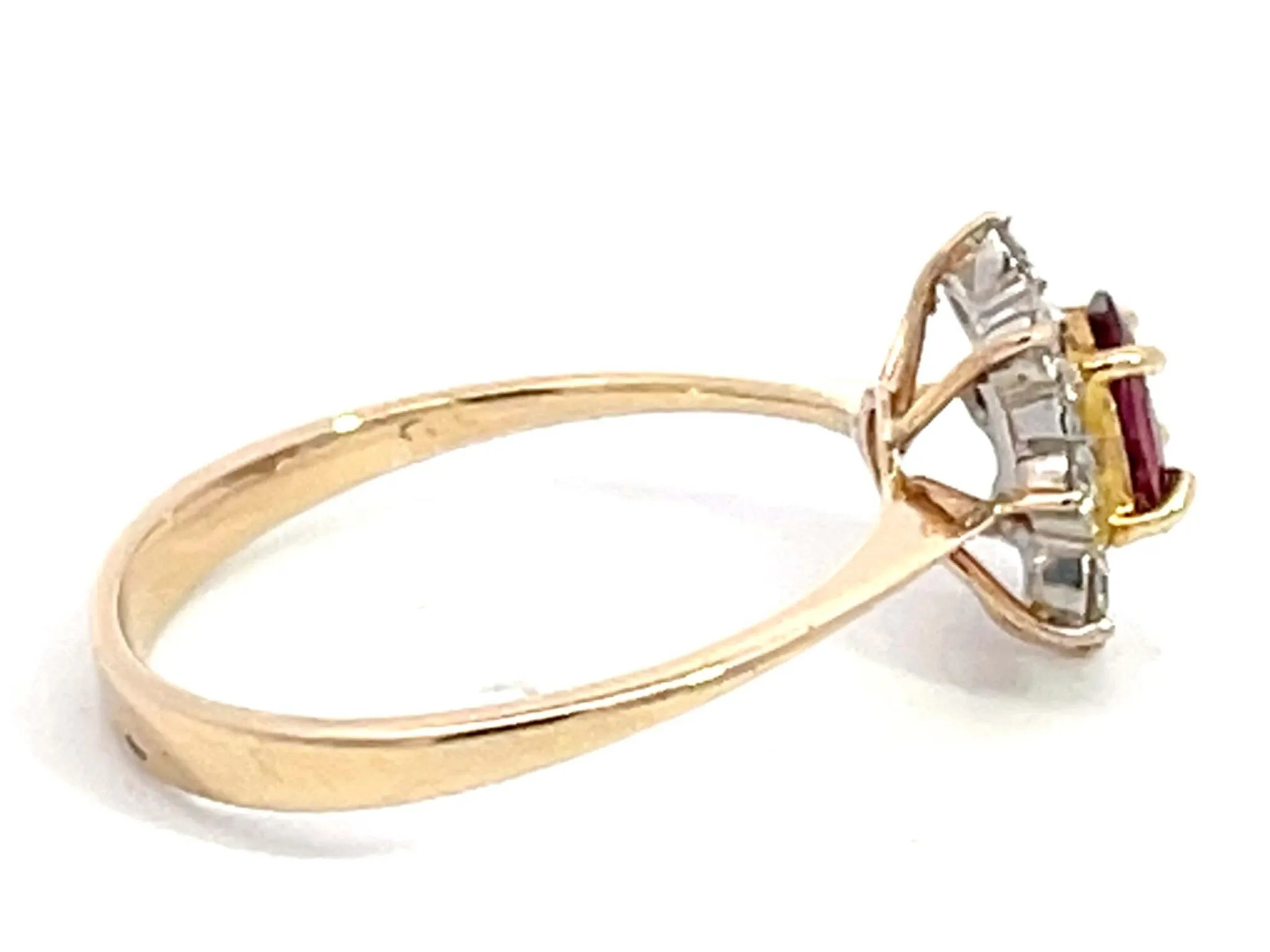 Oval Ruby and Diamond Halo Ring in 14k Yellow Gold