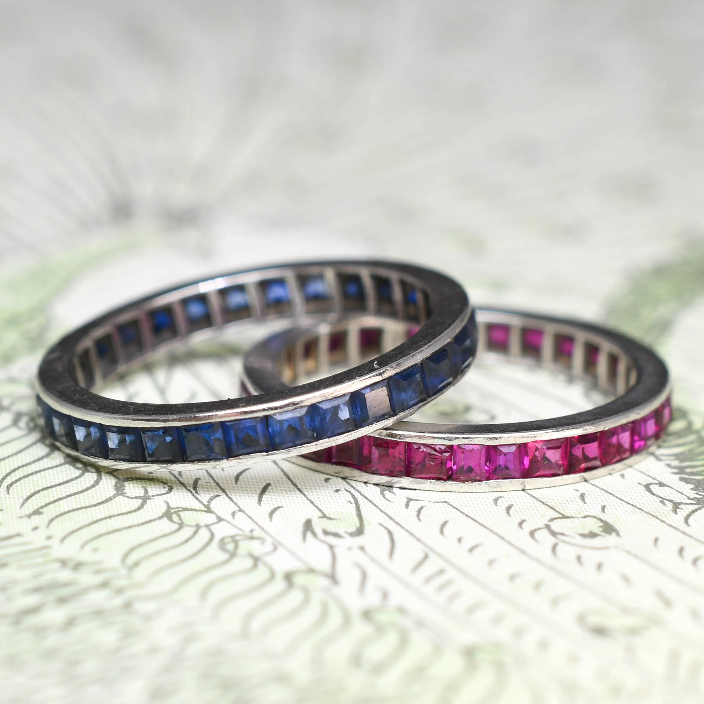 Pair of Art Deco Platinum Sapphire & Ruby Eternity Rings