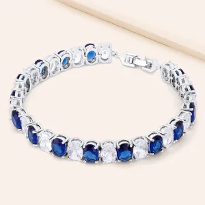"Azure Duet" 40CTW Prong Set Oval Cut Two-tone Tennis Bracelet - Includes Extender