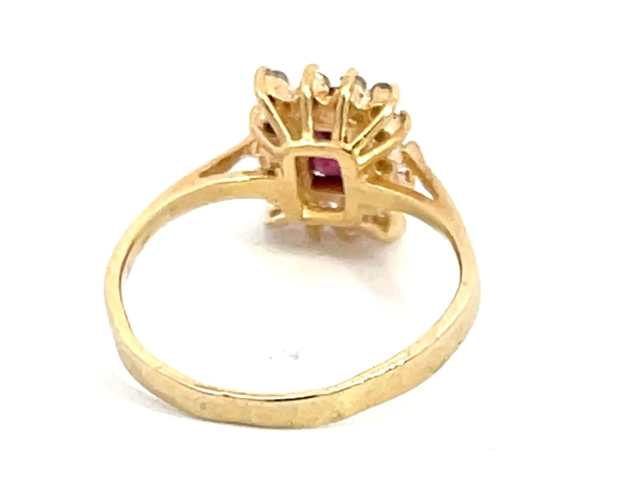 Ruby and Diamond Halo Ring in 14k Yellow Gold