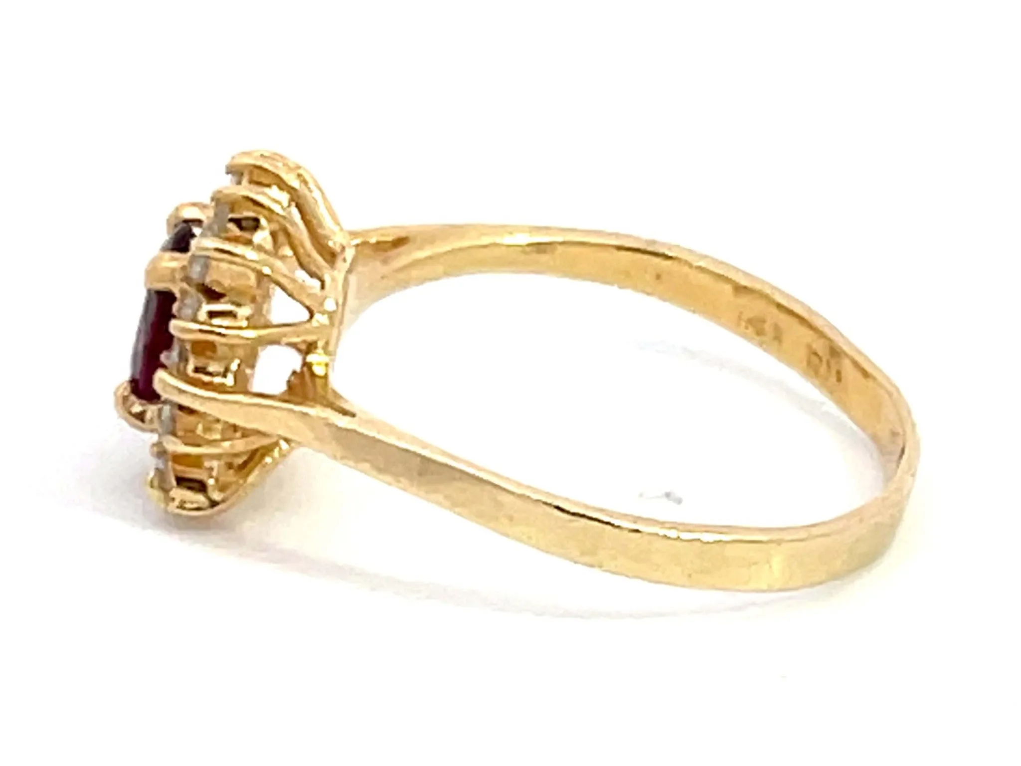 Ruby and Diamond Halo Ring in 14k Yellow Gold