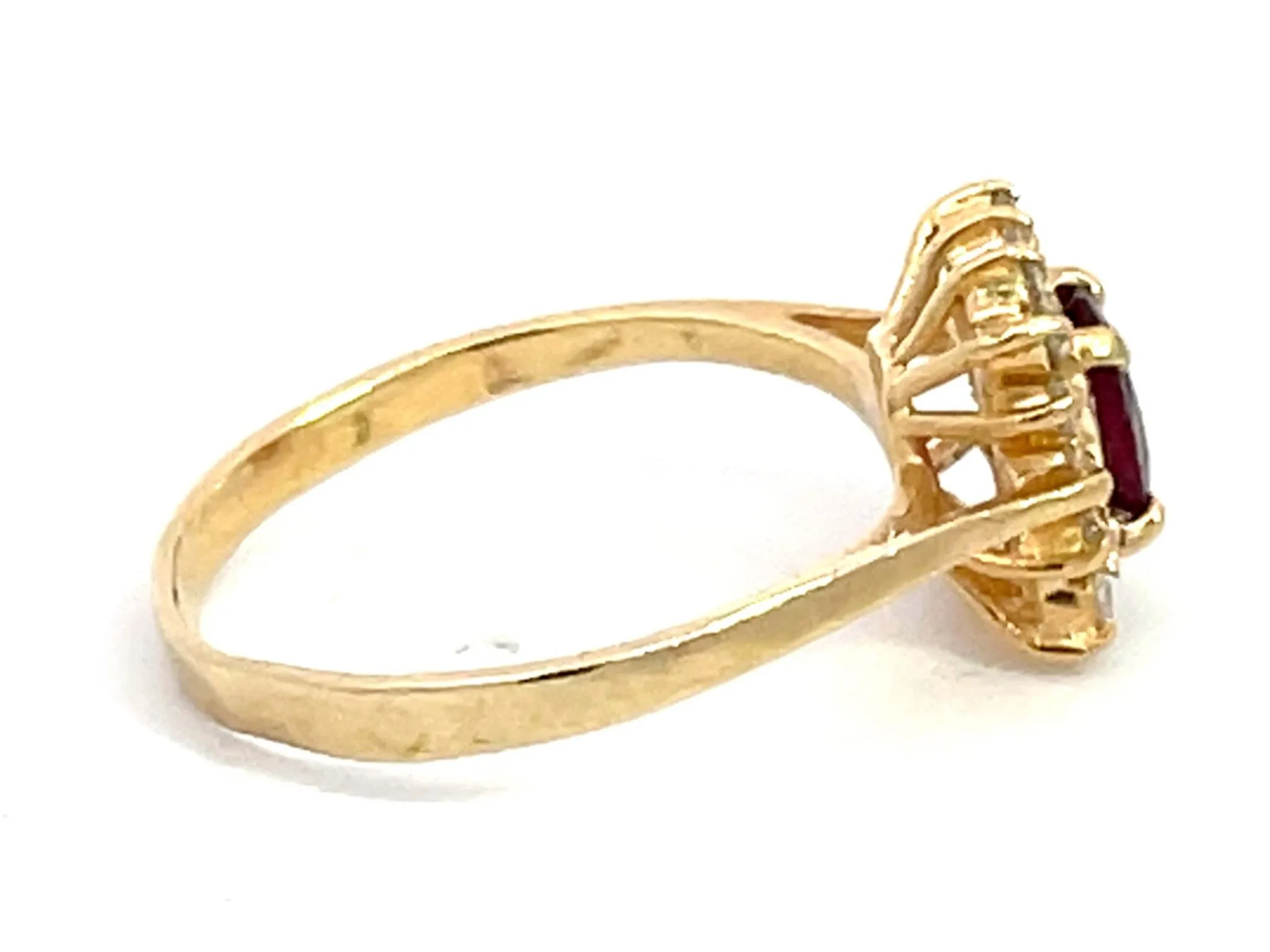 Ruby and Diamond Halo Ring in 14k Yellow Gold