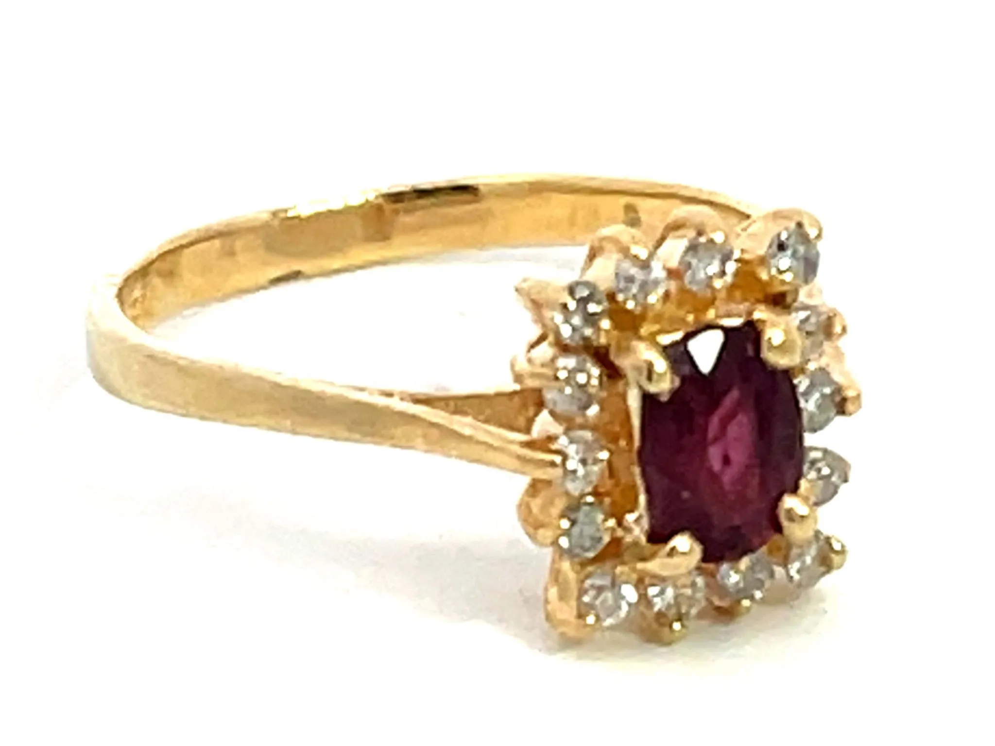 Ruby and Diamond Halo Ring in 14k Yellow Gold