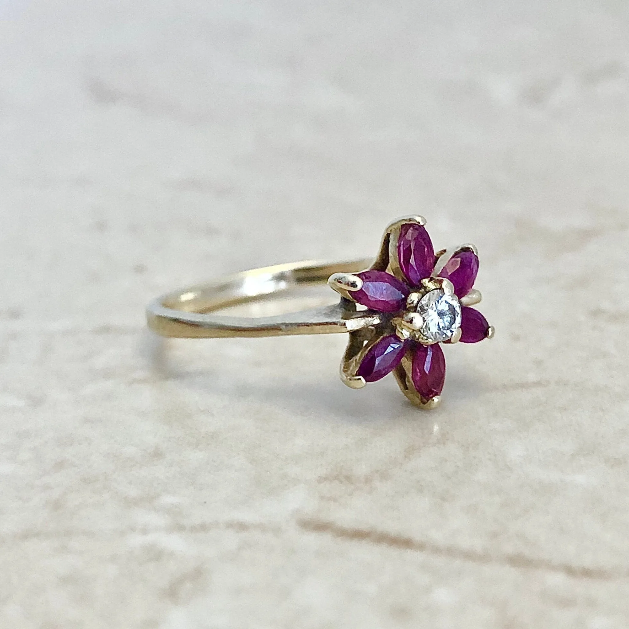 Vintage 14 Karat Yellow Gold Natural Ruby & Diamond Flower Halo Ring